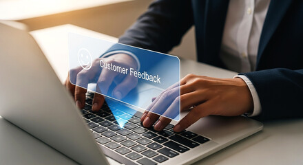 Person typing on laptop with customer feedback overlay in business setting close up shot on white surface