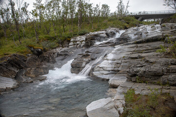 Silverfallet waterfall near the mountain village of Bjorkliden in Kiruna municipality, northern Sweden.