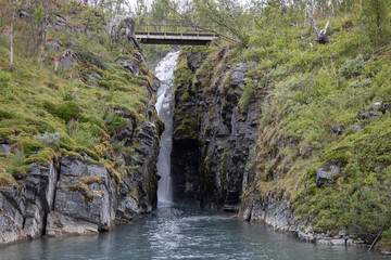 Silverfallet waterfall near the mountain village of Bjorkliden in Kiruna municipality, northern Sweden.