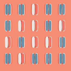 Symmetrical arrangement of stylized capsule objects.