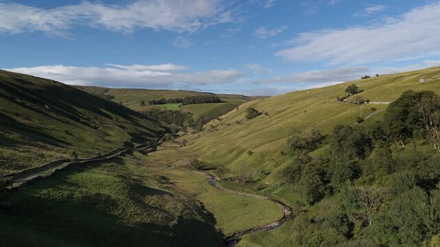 Panoramic Drone View of Stunning Green Valley with Winding Stream in Kettlewell, Yorkshire Dales