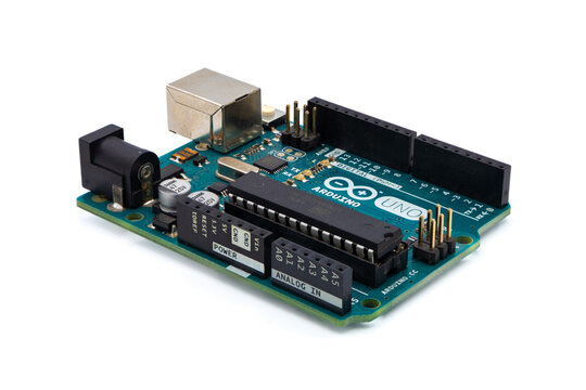 Arduino Uno microcontroller board isolated on a white background, electronics for makers