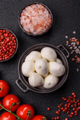 Mozzarella cheese balls, fresh white mini slices for Mediterranean food. Mozzarella cheese