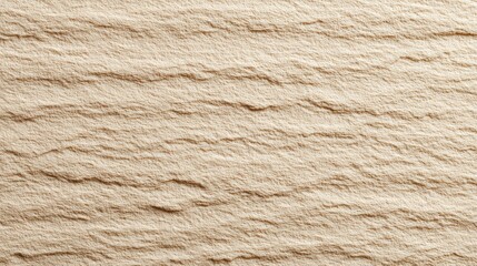 Close-up of light beige stone texture with rippled patterns