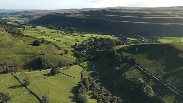 Panoramic Aerial View of Idyllic Kettlewell Village, Upper Wharfedale, North Yorkshire, England's Verdant Landscape