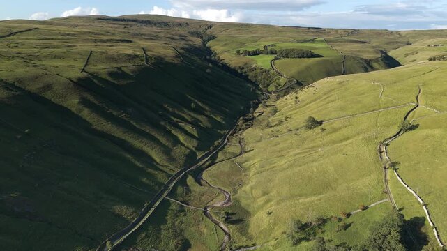 Aerial View Of Lush Green Kettlewell Valley And Rolling Rural Landscape In North Yorkshire