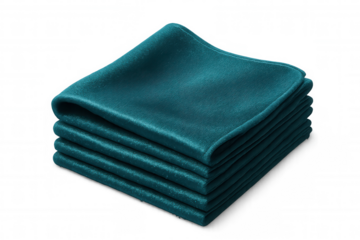 Teal napkins neatly folded, stacked with precision, showcasing refined dining aesthetic against transparent backdrop