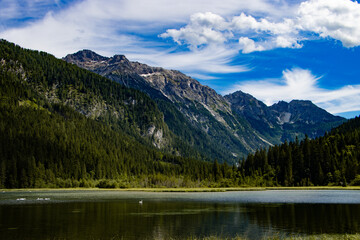 Obraz premium Scenic alpine lake Jägersee with reflection of mountains, Kleinarl, Austria