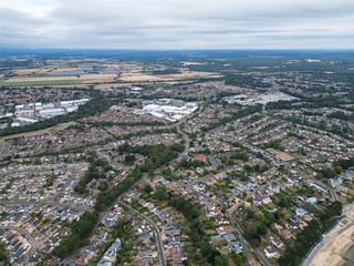 Mudeford aerial shot town over Mudeford Woods. 