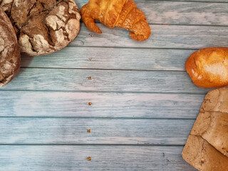 Composition of pastries and bakery products on a wooden board