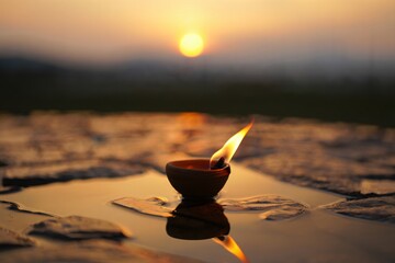 burning candle in the morning