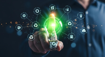 Hand touching futuristic green energy network with icons