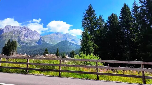 Route in the car along the streets of the Val di Sole, Trentino with panorama in the Dolomites