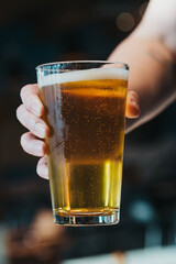 Handed a glass of beer