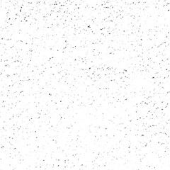 Close-up of a wall texture displaying a blend of white and black colors, emphasizing its unique design.