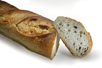 homemade sourdough baguette with golden, crispy crust and soft, airy interior on white background.