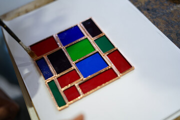 Creative stained glass workshop. Close up 