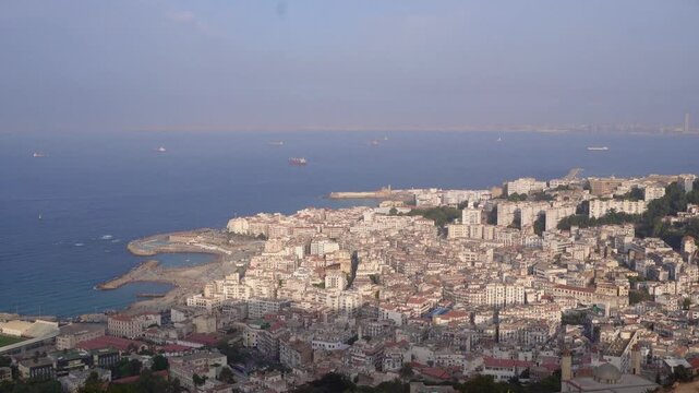 Alger the capital city of Algeria, North Africa, city centre of Algiers, the capital of Algeria, Landscape of Algiers city With port and mediterranean sea and white buildings, Arab Maghreb Africa.