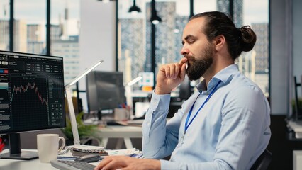Trader in office closing eyes to do daydreaming, visualizing financial independence and future...