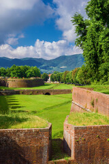 Lucca city walls beautiful park with Mount Pisano from Santa Croce (St Cross) Bulwark