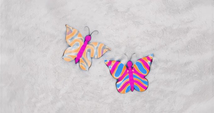 Paper butterflies initiating fluttering at two-second mark, alternating tilting and rotating gently