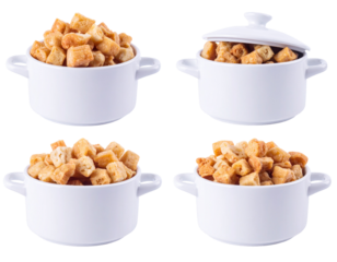 Four small white ceramic pots, each filled with golden-brown, cubed bread crumbs.  One pot per corner.  Open and closed lids visible on two pots