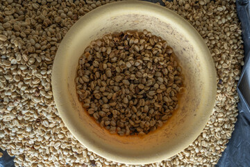 Close-up of coffee beans. showing high quality raw coffee for export. Background