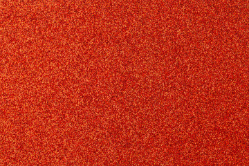 A red background with a lot of orange dots