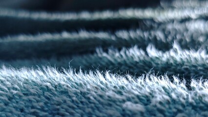 Abstract Macro of Blue and White Textured Fabric with Delicate Fibers.