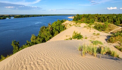 Expansive view of a sandy dune overlooking a serene river valley, vibrant greenery contrasting with light beige sand.