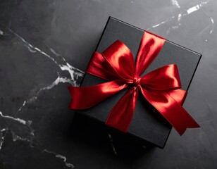 Black gift box with red ribbon