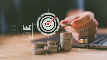 Business finance concept ,stacking coins with growth charts, financial analytics, digital target symbolizing smart investment, strategic saving, budgeting, achieving financial goals efficiently