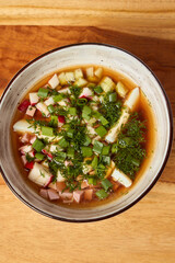 This is a fresh and flavorful homemade soup brimming with an assortment of vibrant vegetables