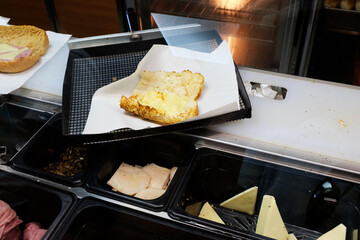 Assorted Cold Cuts and Cheese Displayed At Delicatessen Counter