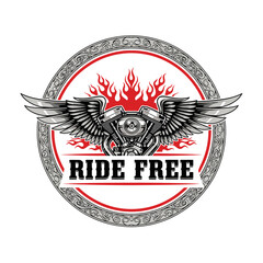 A powerful motorcycle engine emblem with wings and flames. Ride Free.