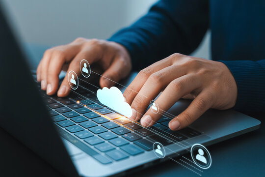 Cloud computing and data management person using laptop for cloud services and data security online