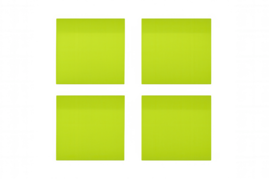 Lime green sticky notes arranged in square formation, positioned on clear surface waiting for writing