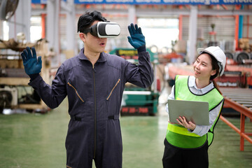 Engineer or technician wearing virtual reality glasses(VR) in containers warehouse storage
