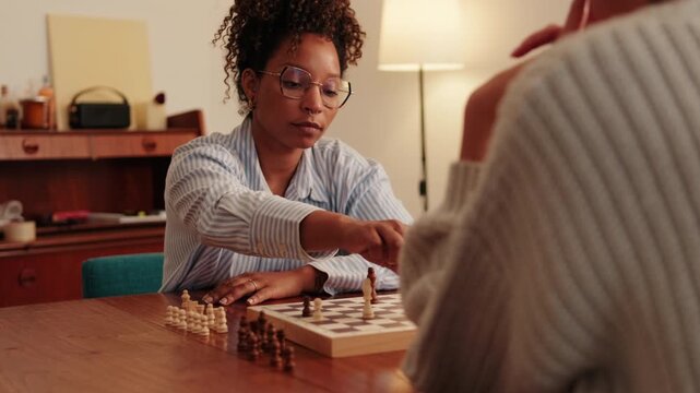 Friends Playing Chess at Home