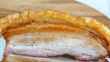 Crispy fried pork on white plate