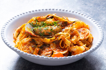 italian seafood pasta in tomato sauce