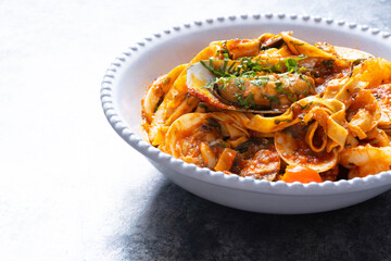 italian seafood pasta in tomato sauce