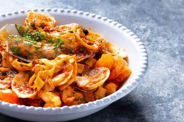 italian seafood pasta in tomato sauce