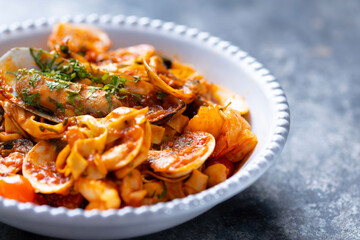 italian seafood pasta in tomato sauce