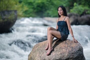 Serene Nature Escape with Waterfalls and Streams in a Forest Setting