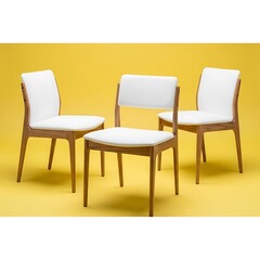 Three light wooden chairs with white upholstery against a bright yellow background