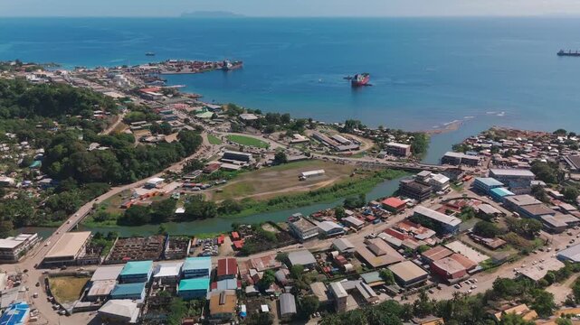Aerial view of downtown Chinatown and Honiara port in the distance.