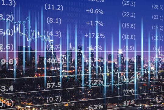Beautiful night cityscape and stock market hologram