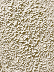 Stippled plaster on the wall
