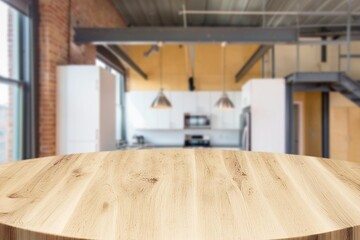 Empty wood desk top and kitchen interior
